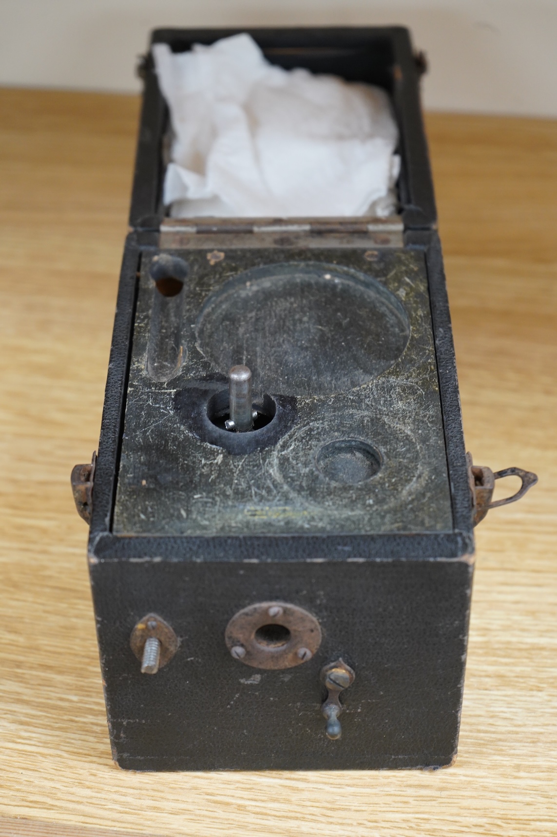 A late 19th century miniature portable gramophone, with a celluloid speaker, possibly Kammer & Reinhardt, 11 x 16 x 14.5cm